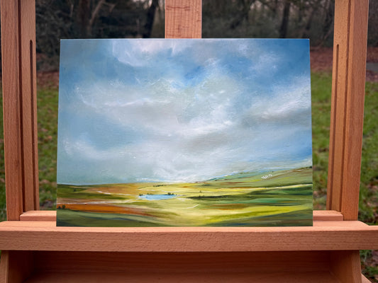 Oil painting of a peaceful green landscape with a lake under a bright, expansive sky.