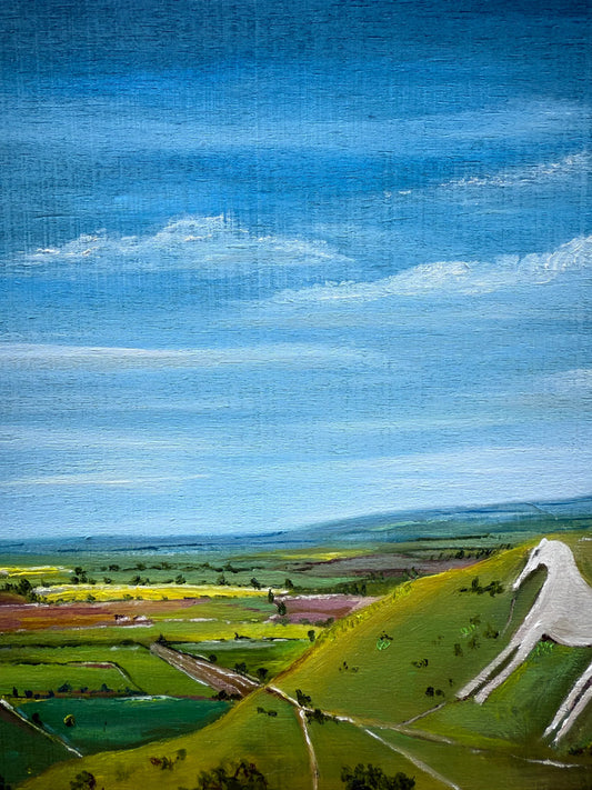 Oil painting of Westbury White Horse on a green hillside under a blue sky with fields.